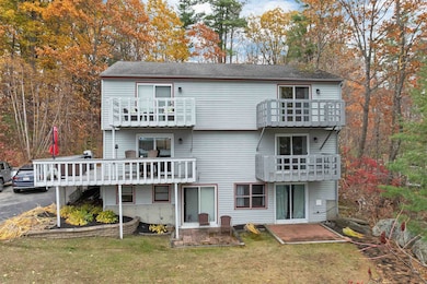 7 total condos. Unit 7 is on the right with 3 levels and 2 balconies.