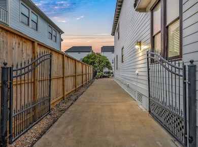 Long driveway for parking with privacy gate