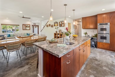 Open kitchen features a gas range