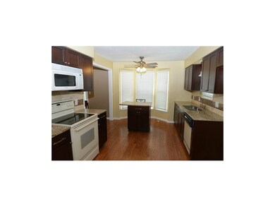 Kitchen with laminate floor, new upgraded cabinets