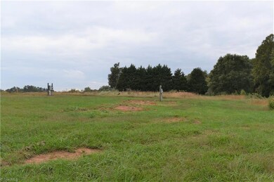 A view west back to the road of the lower home site locations.