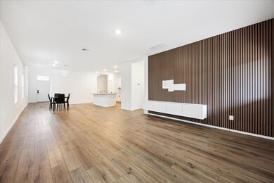 Unfurnished living room featuring light wood-styl