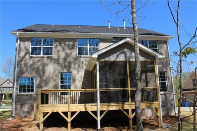 Back of the House with A Screened Room and BBQ Deck