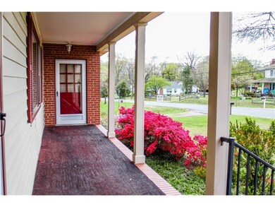 2 front doors into house; main one to foyer (far l