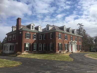 Exterior Front. North wing of the house is the kit