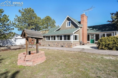 Front of home with circle  driveway