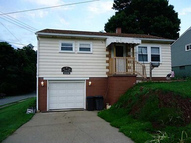 Exterior Front. Garage & driveway for off street p