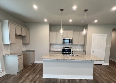 Kitchen featuring stainless steel appliances, a ki