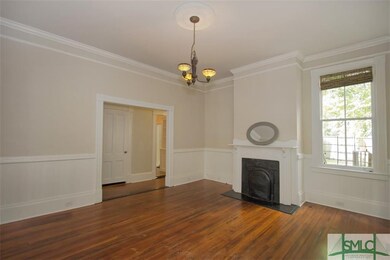 Enter the dining room thru original pocket doors f