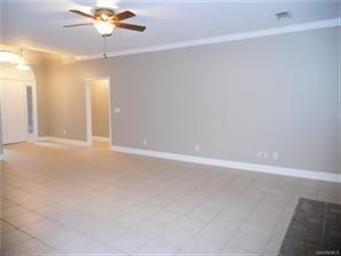 View from the kitchen into the family room area. D