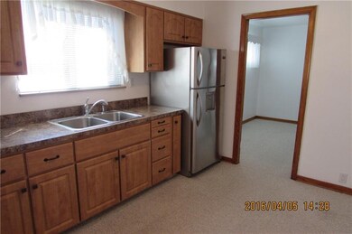 Updated kitchen with direct access to living room 