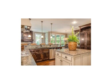 Kitchen with Granite Counters, Breakfast Bar and I