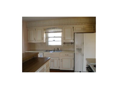 408 N Adams St, Raymore, MO 64083 - photo 7