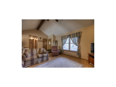 Easy care, wood-look laminate flooring. Vaulted ce