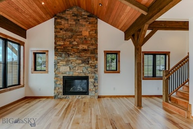 Great room with Douglas fir beams and natural ston
