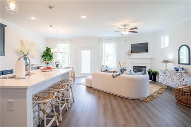 Living room featuring sink, crown molding, wood-ty