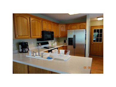 Kitchen. Laundry area next to kitchen.