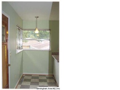 Eat-in area of kitchen.  The door leads to the HUG