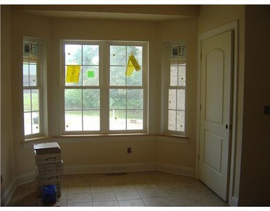 Kitchen. Enjoy the light from the windows in this