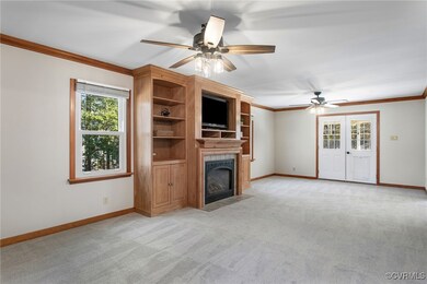 Family room with fresh paint, new carpet, built-in