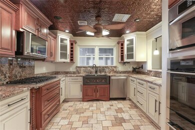 Decorative copper ceiling!  Granite counters, 6-bu