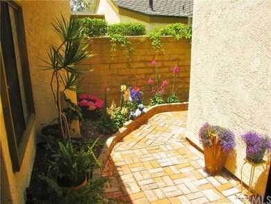 Beautiful gated private front court yard.