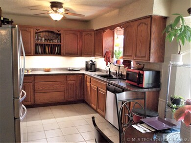 Kitchen window overlooking the pool.  Microwave ca