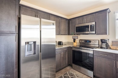Kitchen featuring appliances with stainless steel