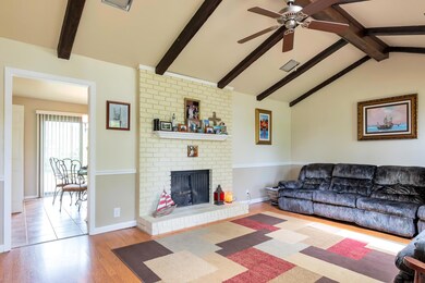 Gas Fireplace and Ceiling Fan in living room