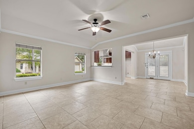 View of the living room without staging. It's a large open space with several options for furniture configuration.