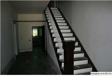 One of the two staircases leading to the second fl