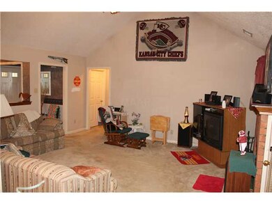 vaulted ceilings and wood burning fireplace!