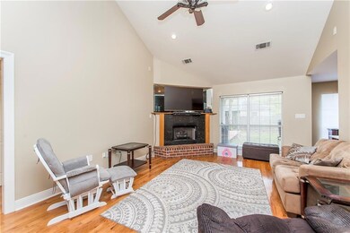 Living area with Cathedral ceilings and gas firepl