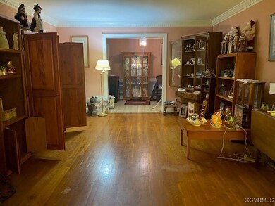 Miscellaneous room with ornamental molding and har