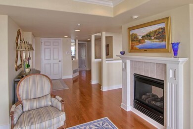 Stairs to the suite, to the left of the fireplace.