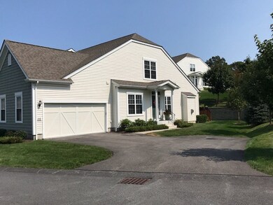 DISTANT VIEW OF HOME WITH 2 CAR GARAGE TO LEFT OF