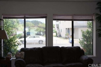 Front windows in living room.