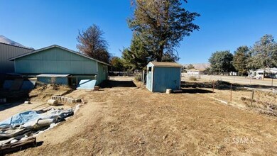 Rear of Garage and Wood Sheds
