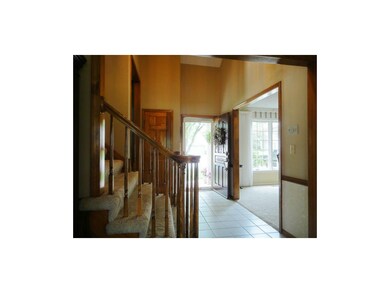 Grand 2 story entry with tile floor