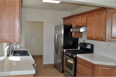 4386 Kitchen with custom tile and stainless steel 