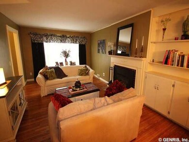 Living Room Spacious living room with refinished h