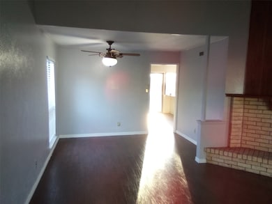 Dining room with wood style floors and ceiling fan