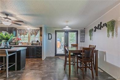 Tiled dining room featuring french doors, a textur