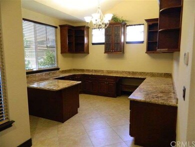 Office area with many cabinets and shelves