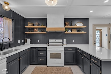 Updated kitchen with quartz countertops.