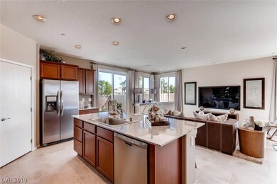 Photo is of model home kitchen and great room