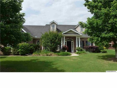 A covered front porch to welcome family and friends with professional landscaping and exterior recessed can lights plus flood lights.