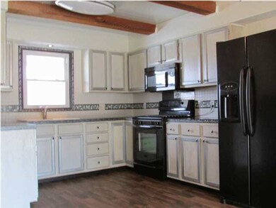 Kitchen/Dining Combo with vinyl flooring