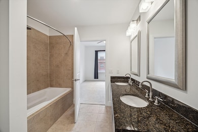 Immaculate granite primary bedroom w double sinks,