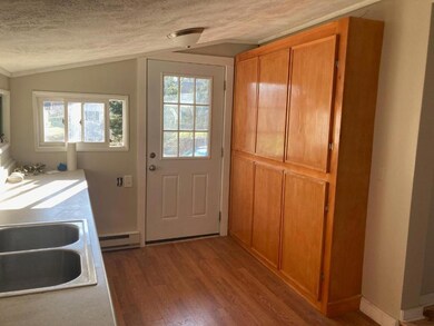 Kitchen also has ample storage in this pantry. The
